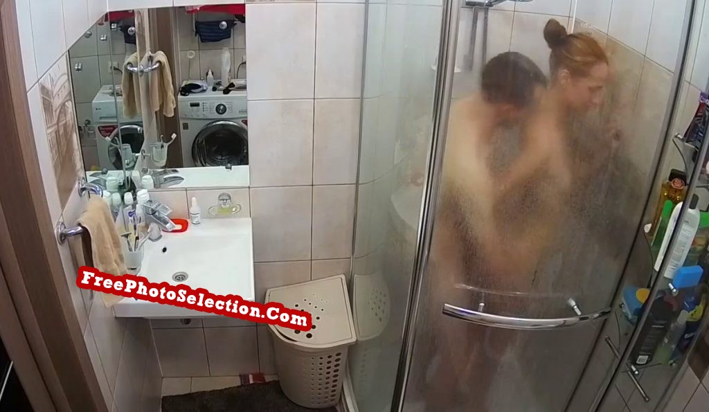 Teen girl turns her back to a boy in the shower so he can fuck her